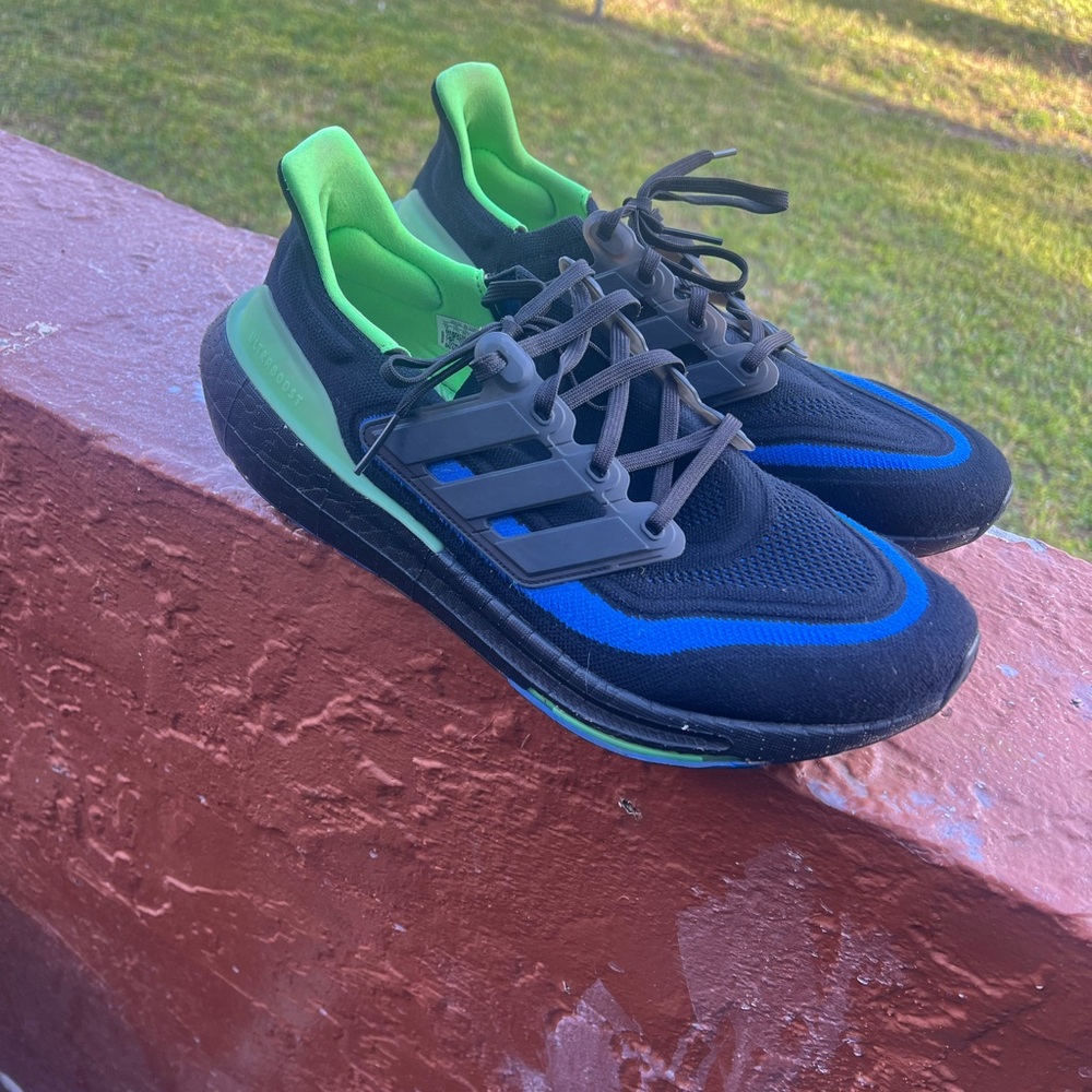 Black and Blue Athletic Sneakers with Green Accents